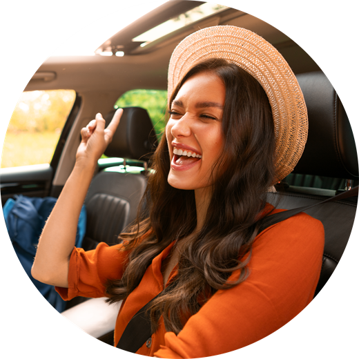 Smiling member in a car